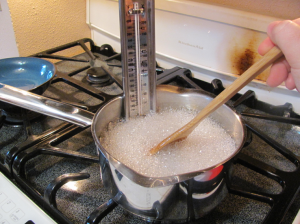 Mixing, mixing, mixing as the sugar SLOWLY rises in temperature. 
